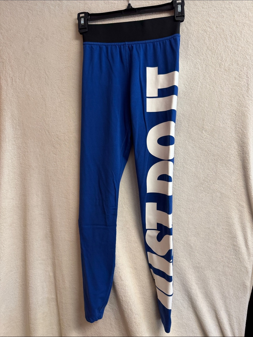 Nike Blue Leggings with White Vertical Logo and Black Waistband